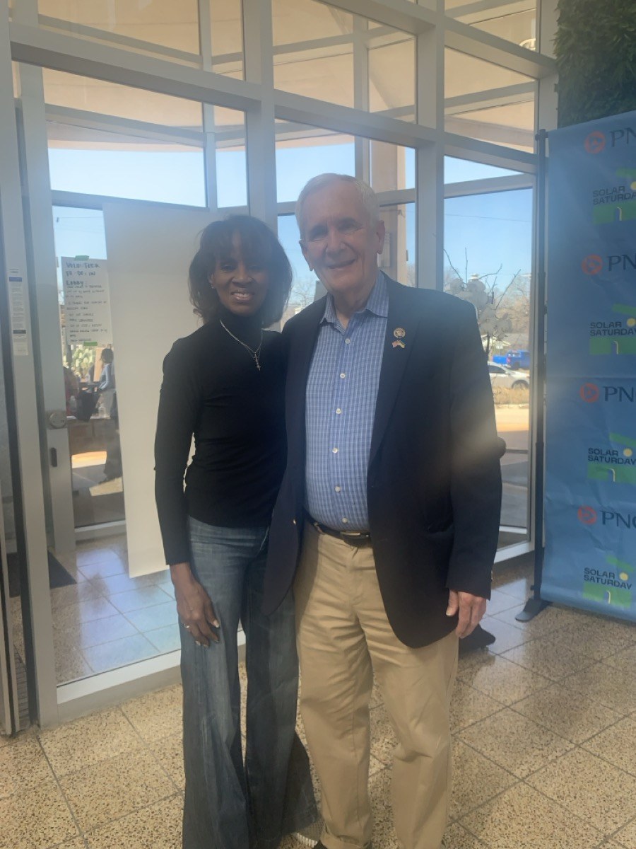 U.S. Congressman Lloyd Doggett with a neighbor at a PSSNA community event